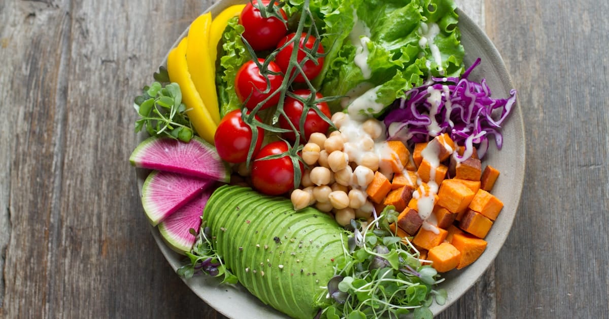 Balanced Nutrition Plate A balanced plate with fresh vegetables, whole grains, and lean protein